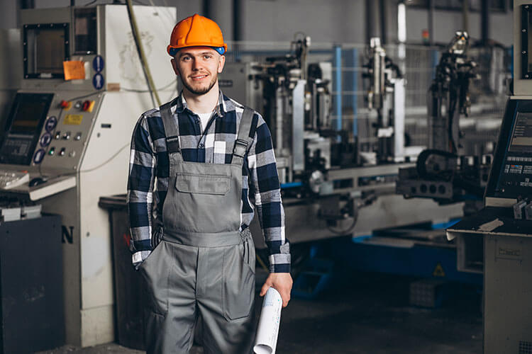 worker ready to clean bellows for industrial machinery